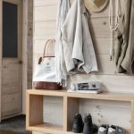 elements minimal mudroom hallway foyer design a floating pine shelf offers a spot for bags shoes and mail bobby houstons cabin decor modern cabin decorating ideas country living