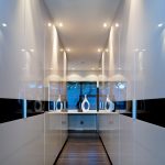 exterior entrance hall with a modern decor wall white mica wood flooring fitted wall lights as well as two bottles and mirrors beautiful hallway design ideas a narrow hallway cabinet inspiration